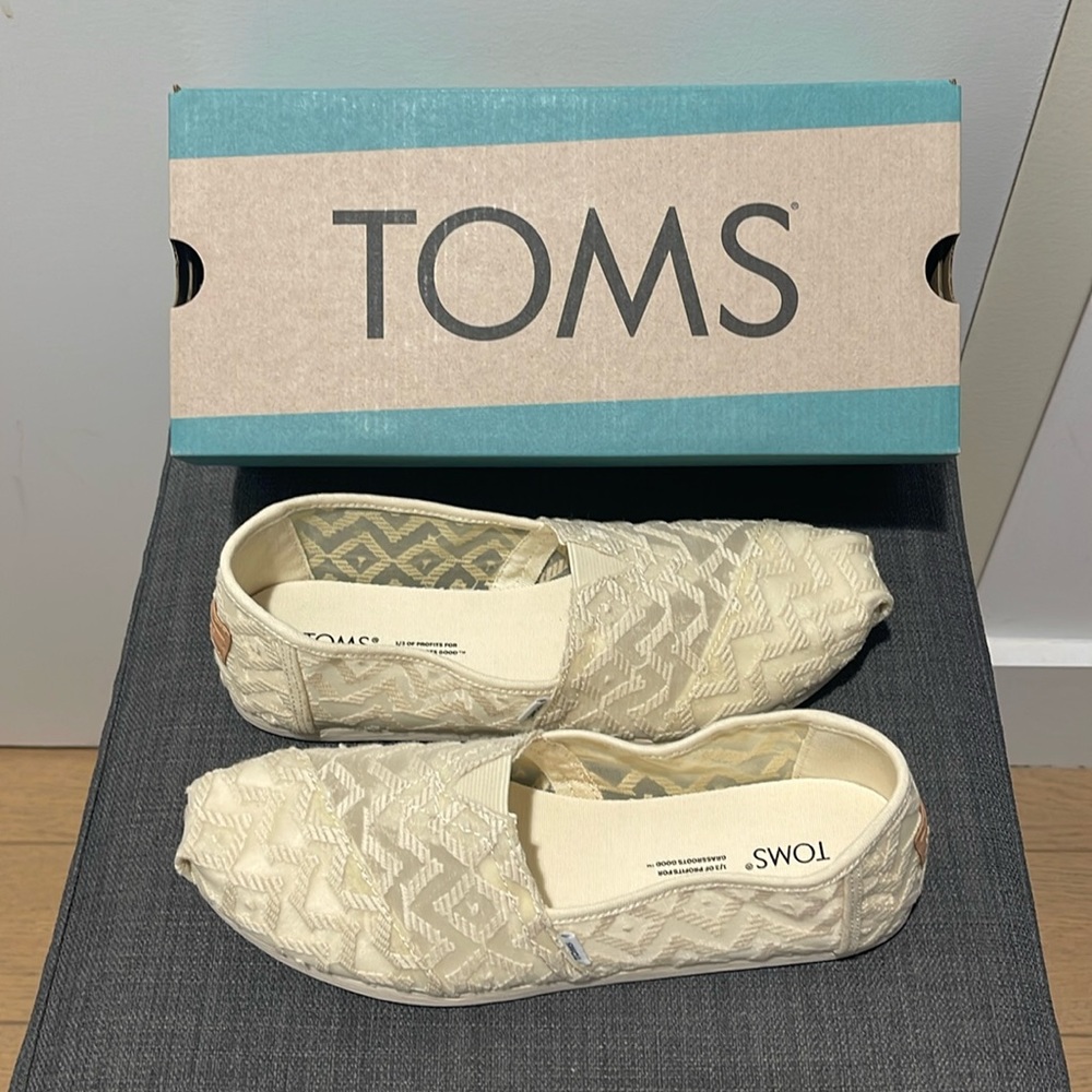 Brand new, never worn Toms